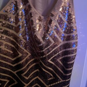 Rose Gold hip length tank.  Excellent condition